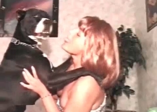 Redhead makes out with her own dog