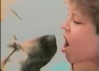 MILF teases her pussy for a dog