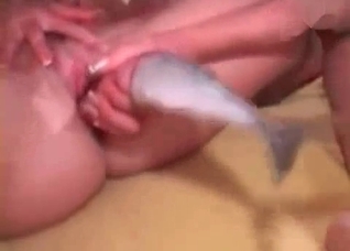 Lesbians fucking each other with fishes