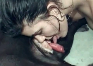 Sweaty brunette sucking cum out of it