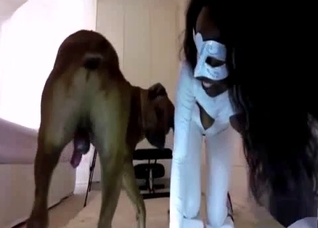 Ebony slut in a white bodysuit fucks a dog