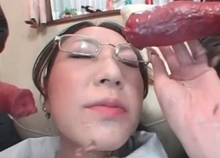Doggy is fucking a lustful Asian whore in the mouth